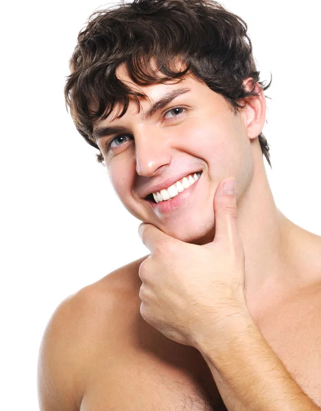A happy man with a clear face. Get treatment for acne and acne scars from Yashoda Singh, MD in Hamilton-Toronto-Niagara.