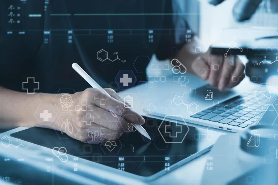 Close-up of a medical professional using a laptop and tablet, with illustrated medical symbols overlayed on the image, symbolizing health conditions treated by Yashoda Singh, MD in Hamilton-Toronto-Niagara.