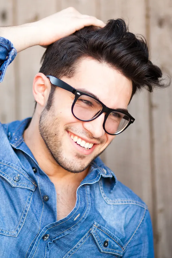 A man with a full head of brown hair. A woman with long, full brown hair. Get ultra-laser hair restoration from Yashoda Singh, MD in Hamilton-Toronto-Niagara.